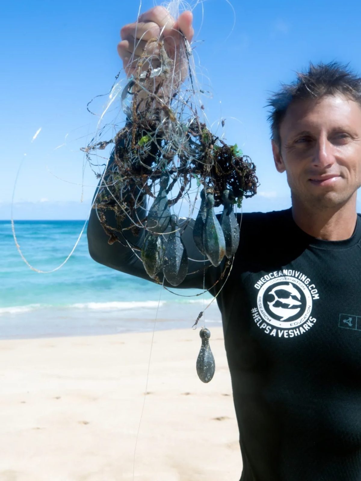 a person standing next to a body of water
